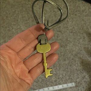 Fossil leather purse charm/key chain with Gold Key - almost new